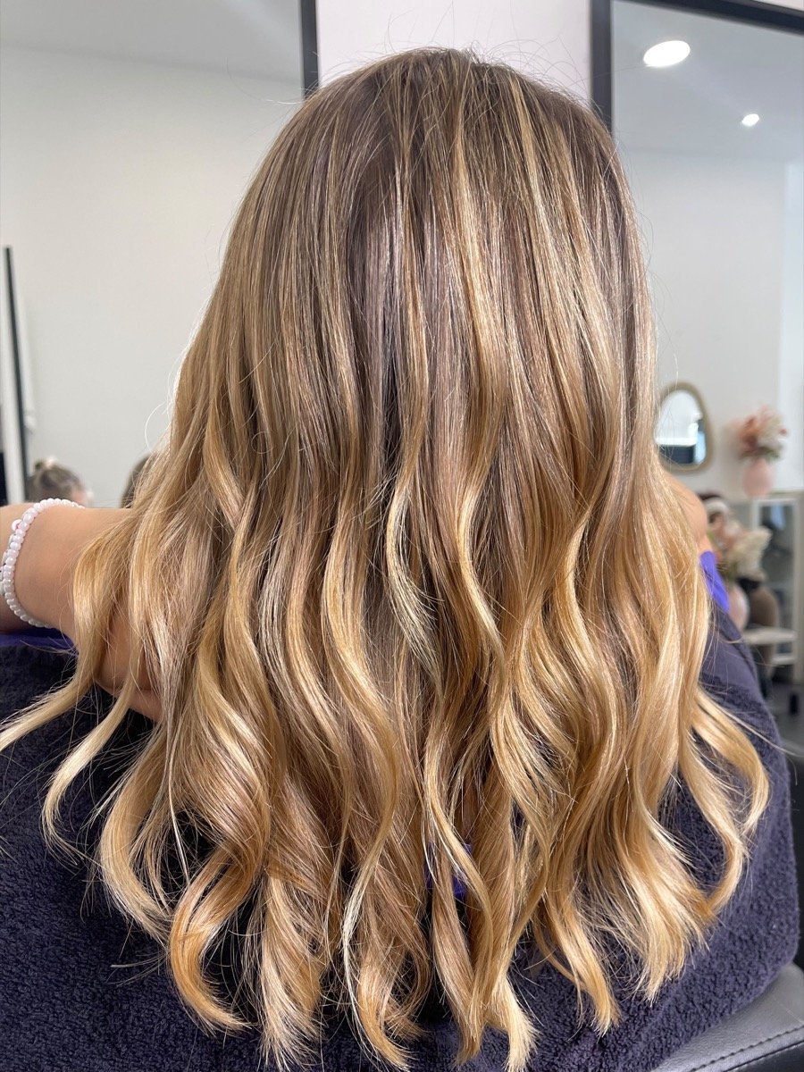 Golden blonde balayage by Dita