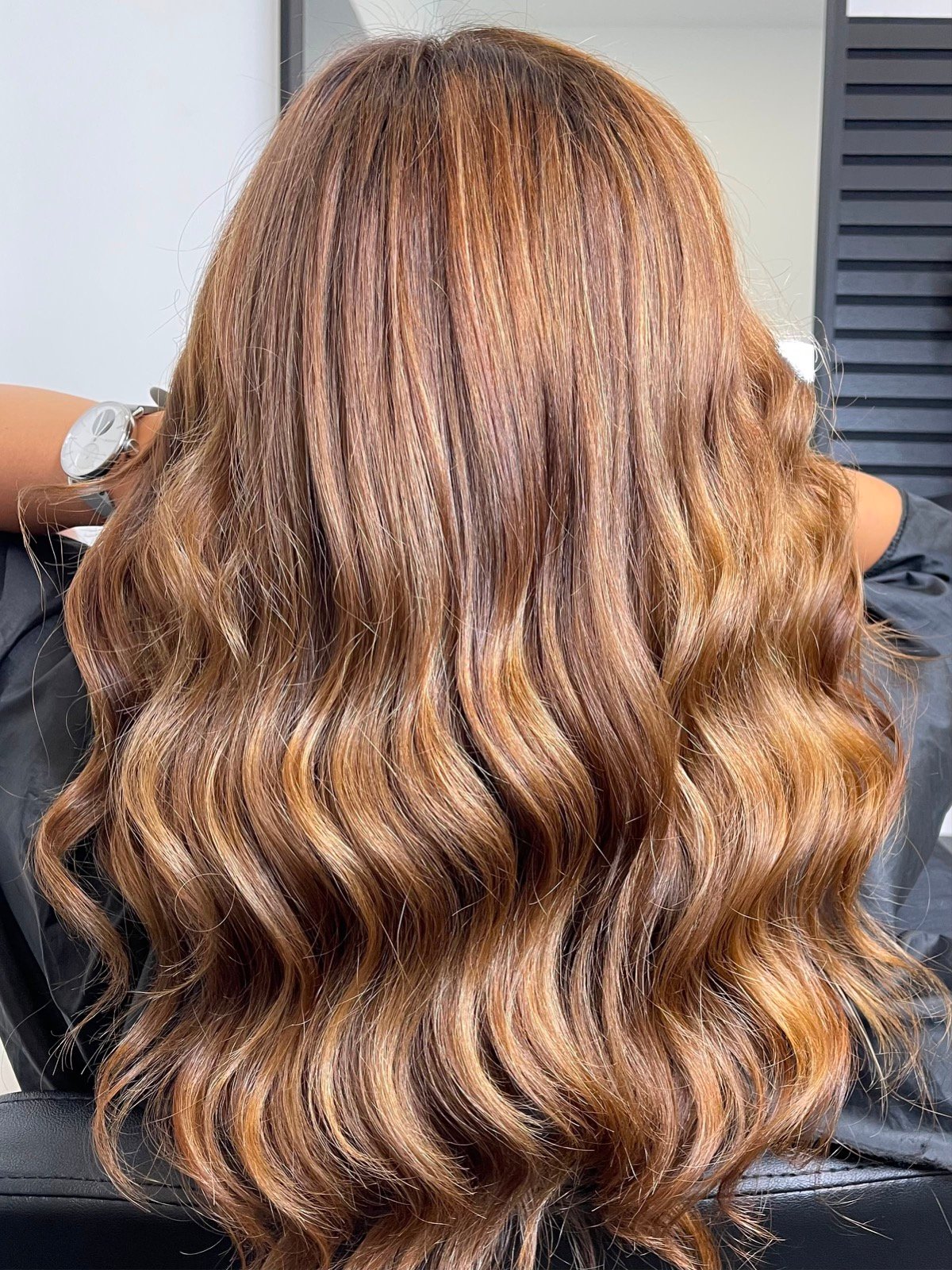 Caramel balayage, back view, styled by Dita at Coloristica